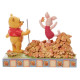 Figura de Pooh e Piglet Enesco no outono