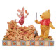 Figura de Pooh e Piglet Enesco no outono