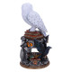 Figura de Hedwig con escudos de casas Harry Potter