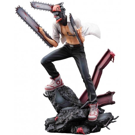 Figura de Chainsaw Man con pose dinámica en terreno rocoso.