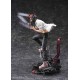 Figura de Chainsaw Man con pose dinámica en terreno rocoso.