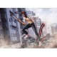 Figura de Chainsaw Man con pose dinámica en terreno rocoso.