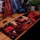 Vade escolar y posavasos de Batman en rojo y negro