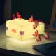 Lámpara Axolotl de Minecraft encendida en tono rosa