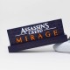 Lámpara LED Assassin's Creed Mirage sobre una mesa