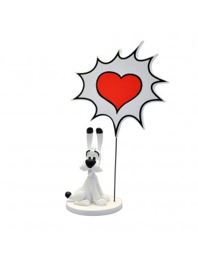 Estatua de resina de Idéfix con cartel de corazón.