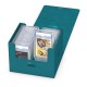 Boîte Ultimate Guard Minthive bleue ouverte avec cartes