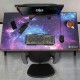 Alfombrilla Enhance XXXL Galaxy sobre escritorio