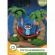 Diorama de Stitch en hamaca entre palmeras