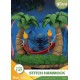 Diorama de Stitch en hamaca entre palmeras