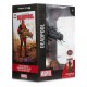 Estátua de Deadpool em traje cinza com quadrinho e diorama.