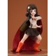 Estatua de PVC de Komekko de 15 cm con capa negra y botas naranjas.