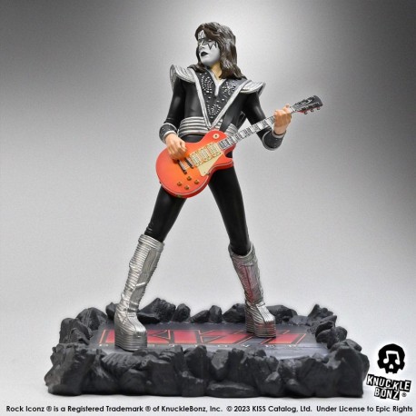 Statue de The Spaceman de Kiss avec guitare orange