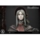 Estátua Bloodborne The Doll com detalhes e função de iluminação.