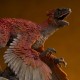 Estatua de dinosaurio Jurassic World Dominion en paisaje nevado