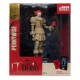 Estátua de Pennywise de 16 cm com fundo de floresta