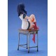 Estátua de Rikka Takarada em uma mesa de Gridman Universe