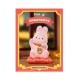 Statue rose de Momo Bunny sur coussin rouge