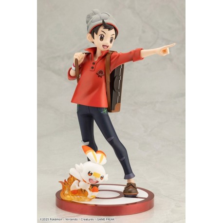Statue de Victor et Scorbunny de Pokémon sur base rouge