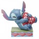 Figura de Stitch de Enesco con un corazón rojo