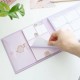 Planificador semanal Pusheen Moments abierto con notas adhesivas