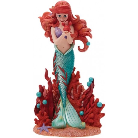 Figura de Ariel Enesco con Flores y Sebastián