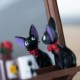 Espelho Jiji de Kiki's Delivery Service com decoração de rosas
