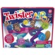 Caixa e acessórios do jogo Twister Air da Hasbro com bandas coloridas e suporte