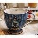 Taza azul Ravenclaw Harry Potter con escudo y estrellas doradas