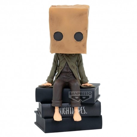 Figura de Mono de Little Nightmares II sobre libros