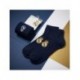 Calcetines Real Madrid azul marino con logo bordado