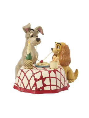 Figurine de La Belle et le Clochard partageant des spaghettis.