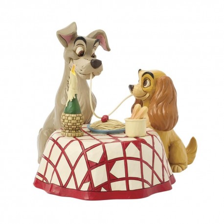 Figurine de La Belle et le Clochard partageant des spaghettis.