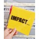 Fanzine Impactrueno jaune avec stylo rouge