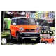 Modelo a escala 1/24 Suzuki Hustler naranja pasión