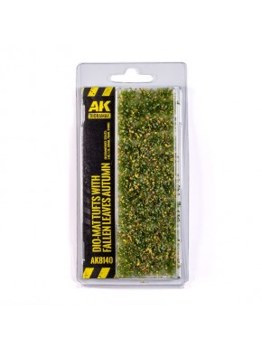 Tapis d'herbe AK avec feuilles d'automne tombées