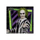 Figura de Beetlejuice com traje listrado e lápide.
