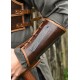Brassard en cuir marron avec détails métalliques
