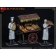 Set de miniaturas de panaderos y carrito en escala 1:35