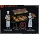 Set de miniaturas de panaderos y carrito en escala 1:35