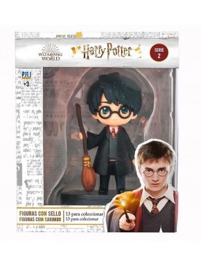 Figurine de Harry Potter avec tampon et balai