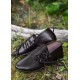 Zapato medieval con cordones de cuero marrón