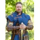 Gambesón medieval azul y marrón con aspecto usado