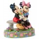 Mickey et Minnie sur banc avec fleurs de Jim Shore