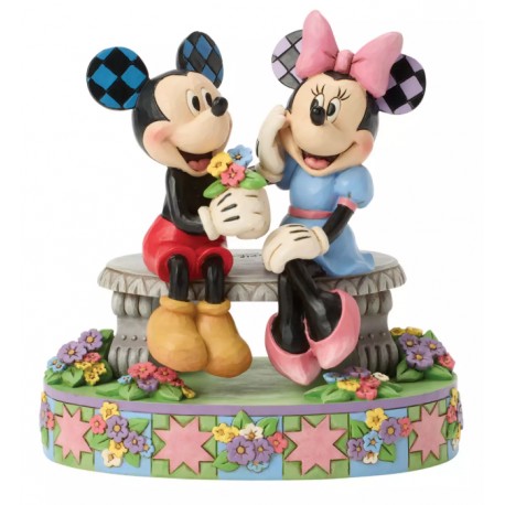 Mickey et Minnie sur banc avec fleurs de Jim Shore
