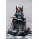 Estátua de Geralt de Rivia sentado no trono