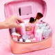 Trousse chic or rose de La Vecina Rubia